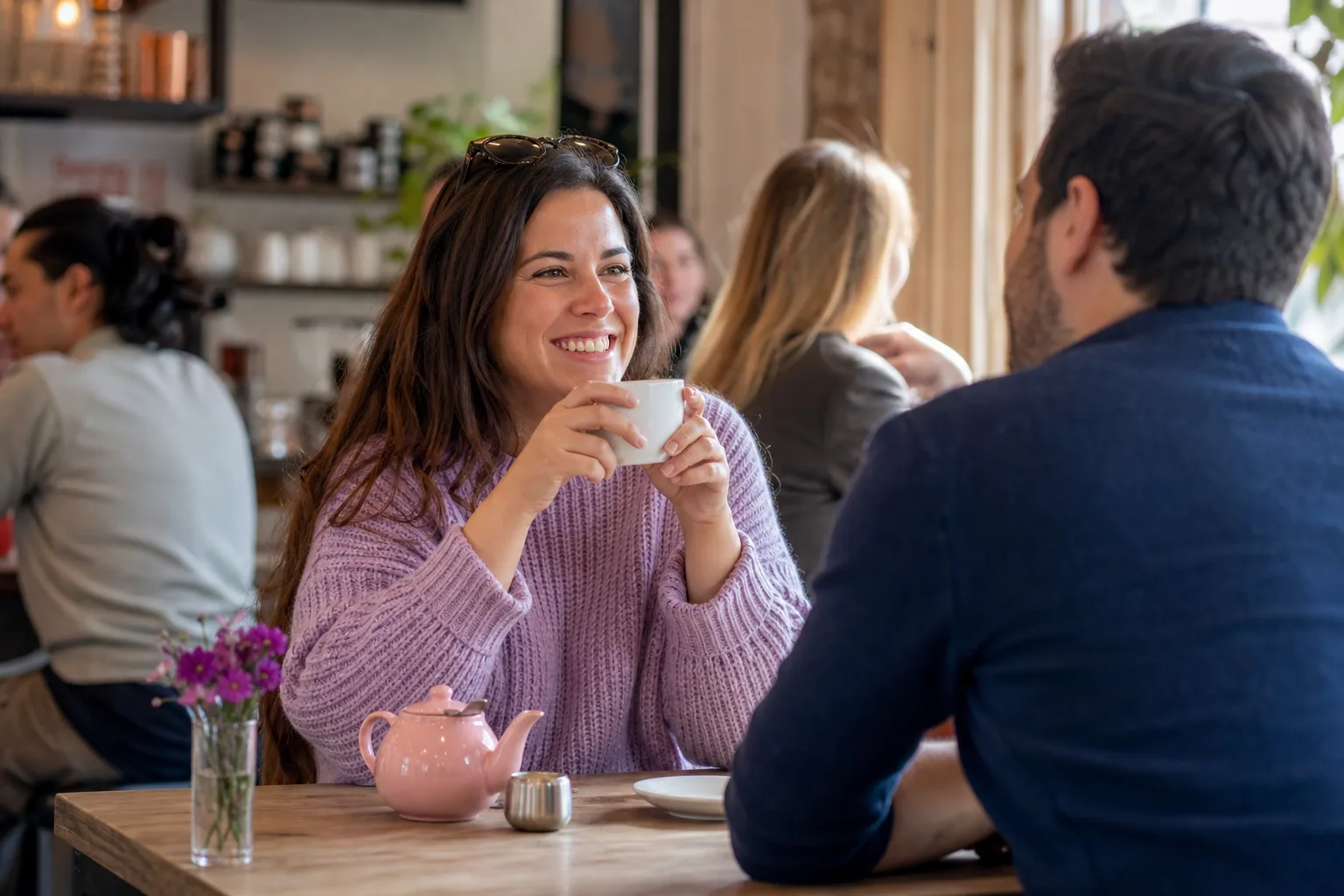 Woman meeting a man for coffee in a Norfolk market town